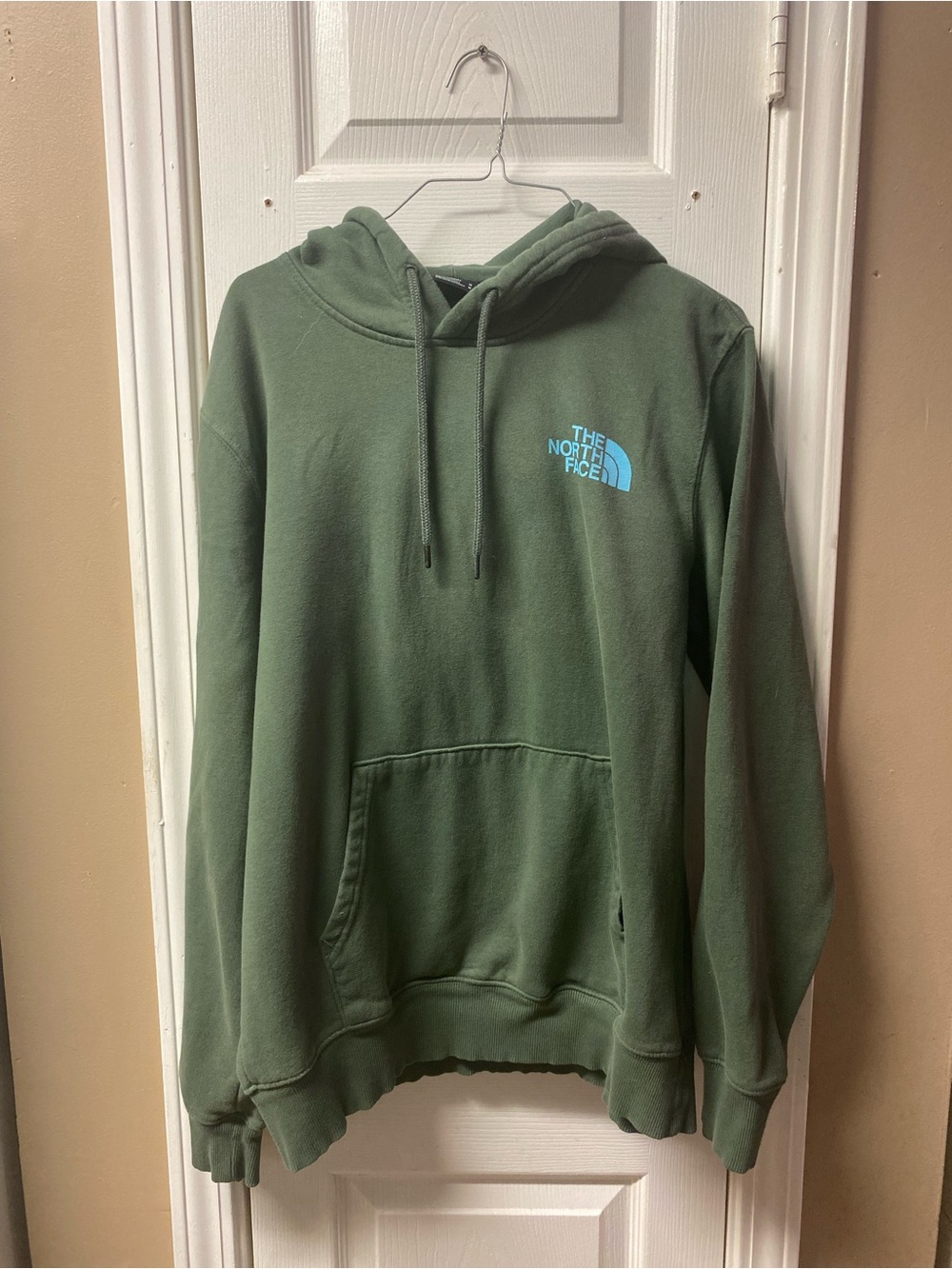 The North Face Men’s Olive Green Pullover Hoodie with Light Blue Logo